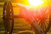 USA, Pennsylvania, Gettysburg, War cannon at sunset in Gettysburg National Military Park