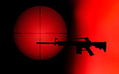 Target crosshair with AR-15 rifle against red and black background