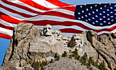 United States, South Dakota, Mount Rushmore with American flag in background