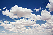 Soft cumulus clouds on blue sky