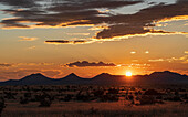 United States, New Mexico, Cerrillos, Sky over Cerrillos mountains at sunset