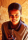 Myanmar, Mandalay, Portrait of smiling teenage girl