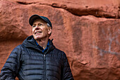 USA, Utah, Escalante, Portrait of senior man hiking in Grand Staircase-Escalante National Monument