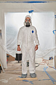 House Painter wearing protective suit and mask