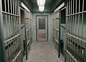 Row of empty prison cells