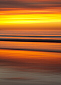 USA, California, La Jolla, Sunset at La Jolla Shores with camera blur