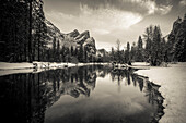 The Three Brothers above the Merced River in winter, Yosemite National Park, California, USA