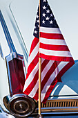 USA, Massachusetts, Cape Ann, Gloucester, antique car show, 1960s Plymouth Valiant with US flag