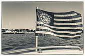 USA, Massachusetts, Cape Ann, Gloucester, America's Oldest Seaport, Gloucester Schooner Festival, schooner US flag