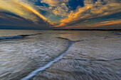 USA, New Jersey, Cape May National Seashore. Sunset on ocean shore