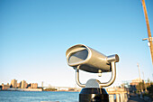 Coin operated binoculars facing the Manhattan Bridge, New York City, New York