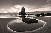 Haystack Rock Pinnacles at low tide in Cannon Beach, Oregon, USA