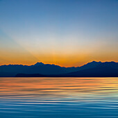 USA, Washington State, Seabeck. Panoramic of sunset on Hood Canal and Olympic Mountains.