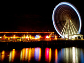 USA, Washington State, Seattle, Great Wheel in reflections and Motion