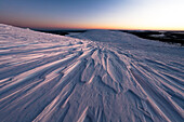 Ice sheets covering the snowy mountains at dusk, Pallas-Yllastunturi National Park, Muonio, Lapland, Finland, Europe