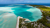 Aerial of the green lagoon, Fakarava, Tuamotu archipelago, French Polynesia, South Pacific, Pacific