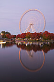 Ferris Wheel at La Grande Roue de Montreal at sunset, Old Port of Montreal, Quebec, Canada, North America