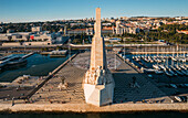 Aerial drone view of Padrao dos Descobrimentos (Monument of the Discoveries), a monument on the northern bank of the Tagus River estuary, Belem, Lisbon, Portugal, Europe
