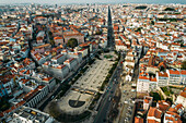 Aerial drone view of Martim Moniz Square in Lisbon, with wider view of northern districts of Lisbon in the background, Lisbon, Portugal, Europe