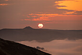 Sunrise with view of Win Hill looking across the cloud filled valley of Edale, Peak District, Derbyshire, England, United Kingdom, Europe