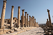 Ancient Roman stone road with a colonnade, Jerash, Jordan, Middle East