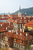 Red roofs of Lesser Quarter dominated by St Thomas church, UNESCO World Heritage Site, Prague, Czech Republic (Czechia), Europe