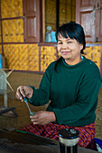 Burmese woman at weaving workshop, Lake Inle, Shan State, Myanmar (Burma), Asia