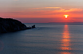 Sunset over The Needles from Alum Bay, Isle of Wight, England, United Kingdom, Europe