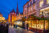 View of Christmas market and Maria Chappel in Oberer Markt at dusk, Wurzburg, Bavaria, Germany, Europe