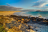 View of beach and the Atlantic Ocean at sunrise, Corralejo Natural Park, Fuerteventura, Canary Islands, Spain, Atlantic, Europe