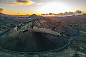 Aerial view of El Cuervo Volcano at sunset, Timanfaya National Park, Lanzarote, Las Palmas, Canary Islands, Spain, Atlantic, Europe