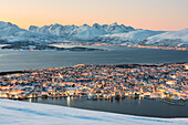 The view of the city of Tromso at dusk from the mountain top, Troms county, Northern Norway, Europe