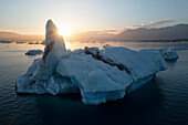 Icebergs during a summer sunset, Jokulsarlon Glacier Lagoon, Austurland, Eastern Iceland, Iceland, Europe