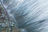 aerial abstract taken by drone of icelandic river during a winter day, Austurland, Iceland, Europe