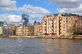 Oliver's Wharf building with City skyscrapers on the background, London, Great Britain, UK