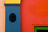 Abstract patterns of color on restored historic buildings.