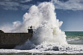 The power of the sea on the dike of the port of Marina di Pisa, province of Pisa, Tuscany, Italy, Europe