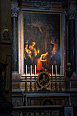 Inside Santa Maria della Scala in Trastevere, the first chapel on the right is dedicated to the canvas representing the "Beheading of St. John in prison" by Gerard van Honthorst. Rome, Lazio, Italy, Europe