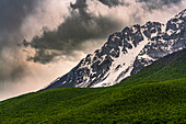 Stormy sky on the top of Sirente still covered with snow. Abruzzo, Italy, Europe