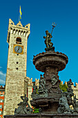 The Triton fountain and the clock tower in Piazza Duomo in Trento. Trento, autonomous province of Trento, Trentino-Alto Adige, Italy, Europe