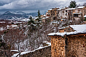 Winter landscape of the small mountain town of Secinaro under the snow. Secinaro, province of L'Aquila, Abruzzo, Italy, Europe
