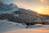 Corno Piccolo peak at sunset after a snow storm. Pietracamela, Teramo district, Abruzzo, Italy