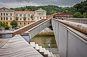 Pedro Arrupe Bridge and in background Deusto University, in Ría del Nervión, Bilbao, Basque Country, Spain