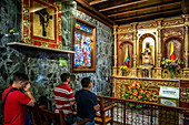 Santuario del Senor de Monserrate, people praying to Morena virgin from Montserrat or Moreneta, Church, Bogota, Colombia