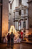 Praying, San Francisco church, Potosi, Bolivia
