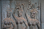 Aspara sculptures in bas-relief on the wall, in Angkor Wat, Siem Reap, Cambodia