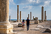 Couple, tourists, Al-Mina archaeological site, Tyre (Sour), Lebanon.