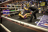 Man knocked out, Muay Thai boxer, Bangkok, Thailand