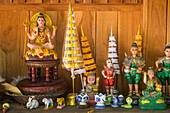 Dolls given as offerings, in Wat Phra Singh temple, Chiang Mai, Thailand