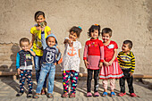 Kids, street scene in Ichon-Qala, old city, Khiva, Uzbekistan